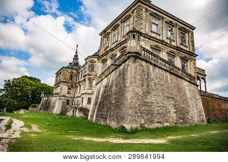 Exterior On The Podgoretsky Castle Of General Access In Ukraine In The Summer On A Clear Day With Bl