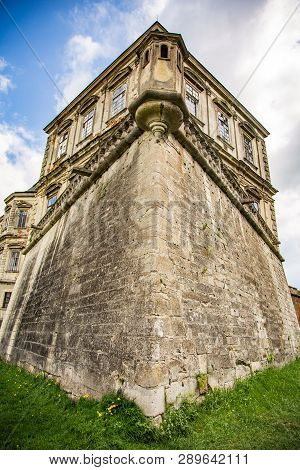 Exterior On The Podgoretsky Castle Of General Access In Ukraine In The Summer On A Clear Day With Bl
