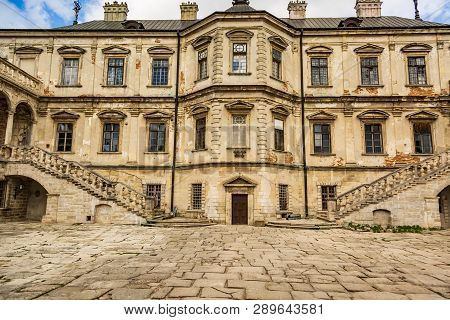 Exterior On The Podgoretsky Castle Of General Access In Ukraine In The Summer On A Clear Day With Bl