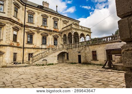 Exterior On The Podgoretsky Castle Of General Access In Ukraine In The Summer On A Clear Day With Bl