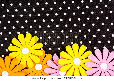 Birthday Gift Card With Red  Ribbon Decoration And Multicolor Flowers Laying On Black Dotted Backgro