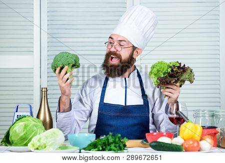 Bearded Man Cook In Kitchen, Culinary. Dieting And Organic Food, Vitamin. Chef Man In Hat. Secret Ta