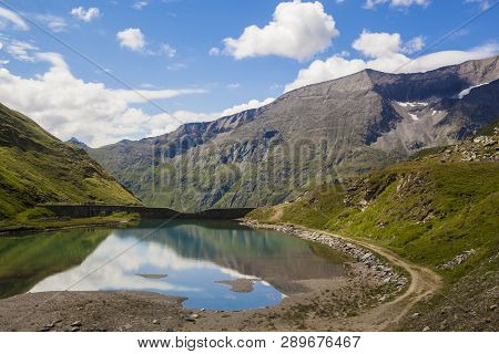 Alpine Lake Called Nassfeld Speicher In Hohe Tauern National Park In Austria