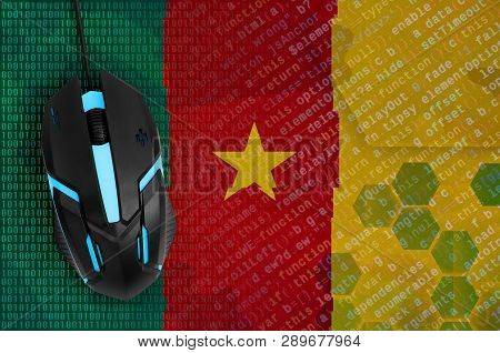 Cameroon Flag  And Computer Mouse. Digital Threat, Illegal Actions On The Internet