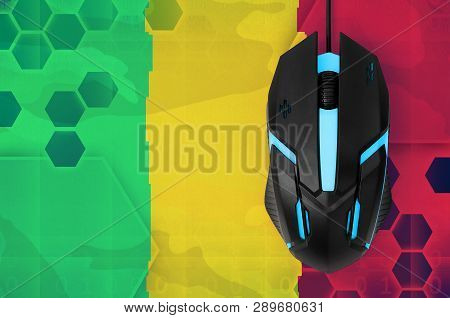 Mali Flag  And Computer Mouse. Concept Of Country Representing E-sports Team