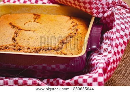 Homemade Semolina Cake On Sackcloth Background. Close Up