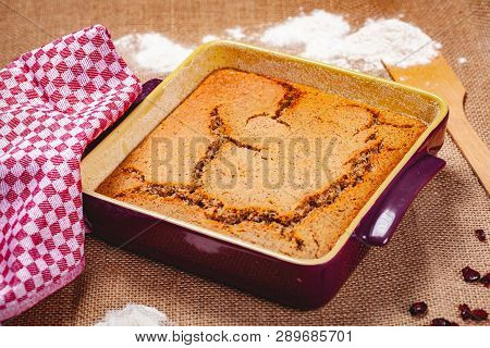 Homemade Semolina Cake On Sackcloth Background. Close Up