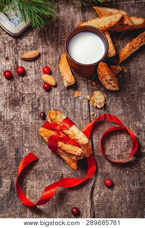 Cantucci With Milk On Wooden Rustic Table. Close Up. Top View. Christmas Or New Year Food Concept