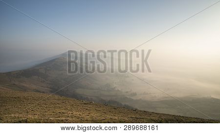 Beautiful Winter Sunrise Landscape Image Of The Great Ridge In The Peak District In England With Mis