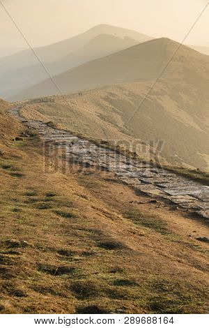 Beautiful Winter Sunrise Landscape Image Of The Great Ridge In The Peak District In England With Mis