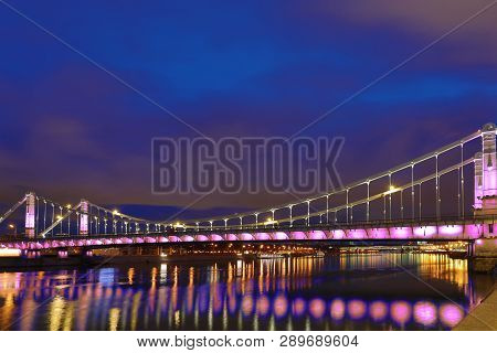 Krymsky Bridge Or Crimean Bridge  Across The Moskva River In Moscow In The Rays Of Setting Sun In Th