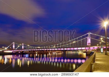 Krymsky Bridge Or Crimean Bridge  Across The Moskva River In Moscow In The Rays Of Setting Sun In Th