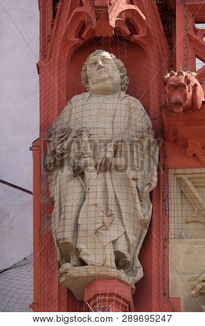 WURZBURG, GERMANY - JULY O4, 2018: Saint Philip the Apostle statue on the portal of the Marienkapelle in Wurzburg, Bavaria, Germany