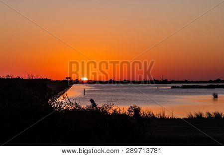 A Beautiful Orange Sunset In The Outer Banks, Pea Island North Carolina