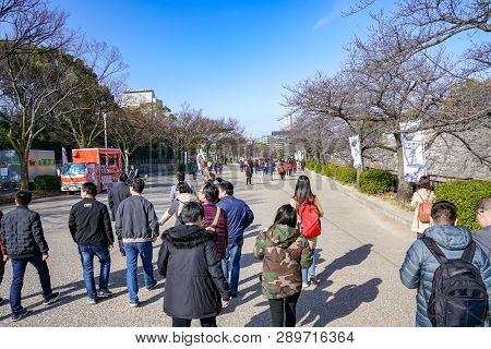 Osaka, Japan - 4 Mar 2018: Japanese, Tourists, Travelers Walked Around Osaka Castle Park In Mar 2018
