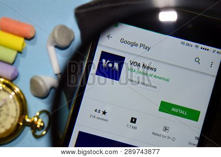 Bekasi, West Java, Indonesia. March 16, 2019 : Voa News Dev App With Magnifying On Smartphone Screen