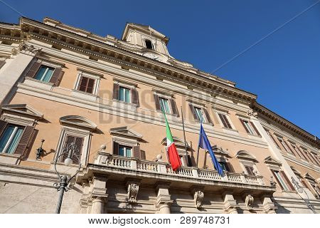 Montecitorio Palace In Rome Seat Of The Italian Parliament With The Flags