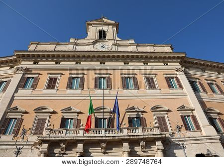 Facade Of Montecitorio Palace In Rome Italy Headquarters Of The Italian Parliament With Flags