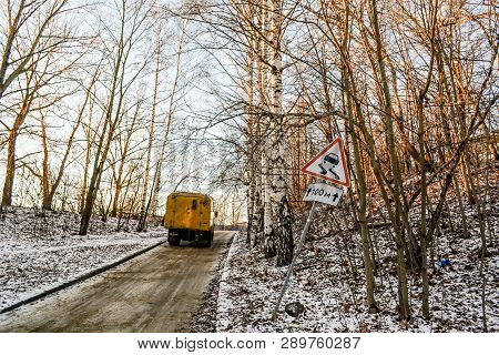 Beautiful Winter Landscape With The Truck And The Traffic Sign.