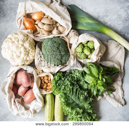 Healthy Vegan Ingredients For Cooking. Various Clean Wholesome Vegetables And Herbs In Woven Bags. P
