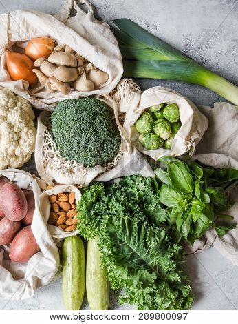 Healthy Vegan Ingredients For Cooking. Various Clean Wholesome Vegetables And Herbs In Woven Bags. P