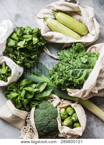 Healthy Green Vegan Ingredients For Cooking. Various Clean Green Vegetables And Herbs In Textile Bag