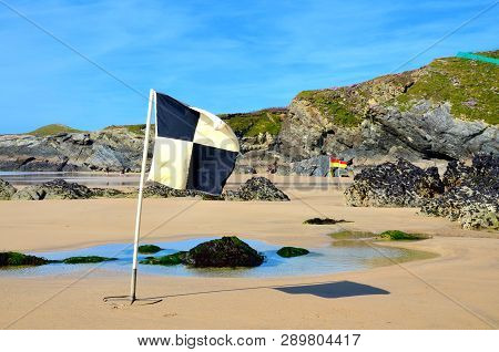 Beach Flags, Lusty Glaze Beach, Newquay, Cornwall