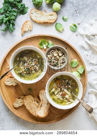 Green Vegetable Vegan Soup From Keil, Brussels Sprouts, Zucchini, Leek With Various Germinated Seeds