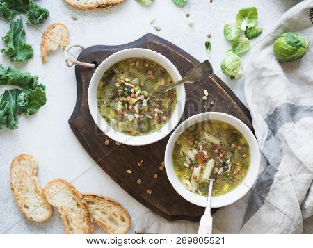 Green Vegetable Vegan Soup From Keil, Brussels Sprouts, Zucchini, Leek With Various Germinated Seeds