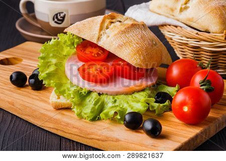 Appetizer With Fresh Tomatoes And Mozzarella And Bread And Parmesan Cheese