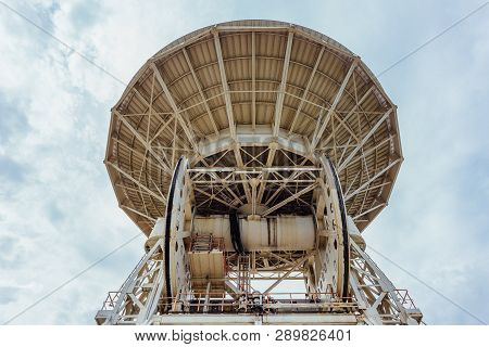Old Rusty Abandoned Radio Telescope Satellite Dish.
