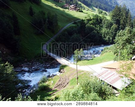 Wooden Paths And Bridges On The Chärstelenbach Stream In The Maderanertal Alpine Valley - Canton Of 
