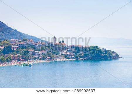 Gradac, Dalmatia, Croatia, Europe - August 24, 2017 - Aerial View Upon Bathing People At The Bay Of 