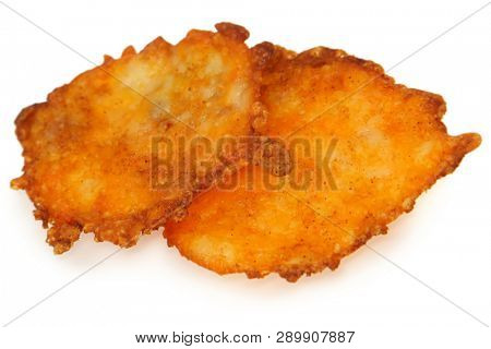 Crunchy keto cheese crisp over white.