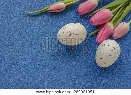 Easter Background With Pink Tulips And Egg On Green Glitter Background With Copy Space