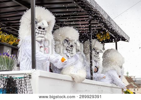 Basel, Switzerland - March 11, 2019: Participants At The Parade Of The Carnival Of Basel. The Carniv