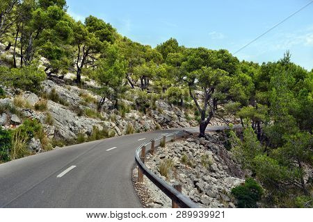 Open Coastal Road Winding Through To Lighthouse Cap Formentor