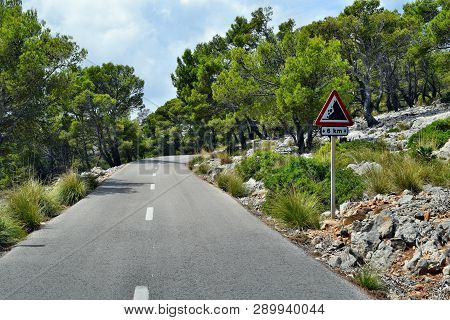 Dangerous Trail With Road Sign To Way To The Formentor Lighthouse In Mallorca
