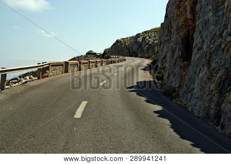 Open Coastal Road Winding Through To Lighthouse Cap Formentor