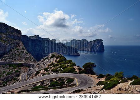 Amazing Landscape When Driving On An Open Coastal Road Winding Through To Lighthouse Cap Formentor