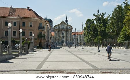 Ljubljana, Slovenia - 07 17 2015 - View Of The Ursuline Church Of The Holy Trinity, Sunny Day