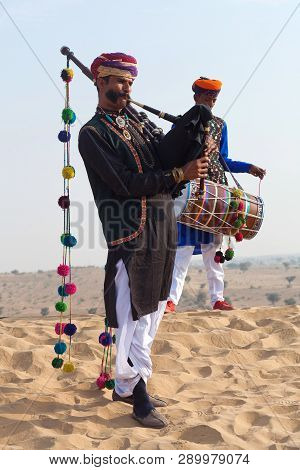 Bikaner, India - January 12, 2019: Indian Band In Traditional Clothes Performing During Camel Festiv