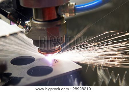 Steel Metal Sheet Cut By Laser Cutting Machine ; Spark Light. Burn The Letters In The Metal.