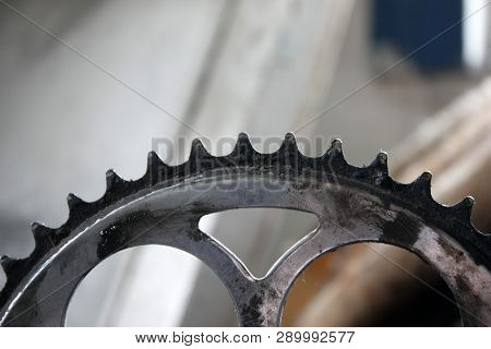 Close-up Of A Bicycle Star. Old Vintage Or Mountain Bike. Cogs Drive Stars For The Chain.