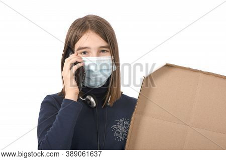 Pre-adolescent Girl Called On Black Smartphone. Isolated On White Background. High Resolution Photo.