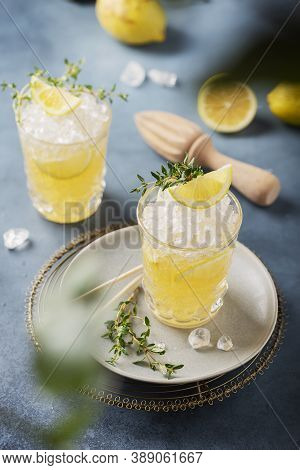 Cocktail With Lemon, Timo And Crushed Ice