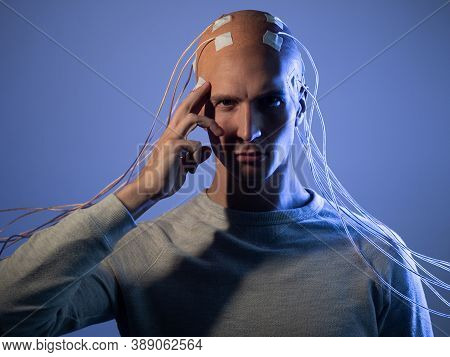 Neurointerface, Brain - Computer Communication. Cyberpunk Concept Of A Futuristic Person Connected T