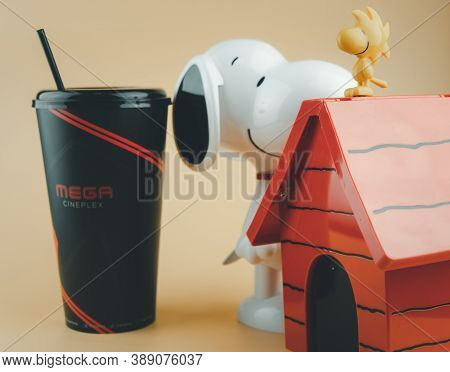 Samut Prakan, Thailand - October 10, 2020 : Set Of Popcorn Bucket And Drink Cup Of Cartoon Snoopy An
