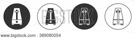 Black Classic Metronome With Pendulum In Motion Icon Isolated On White Background. Equipment Of Musi