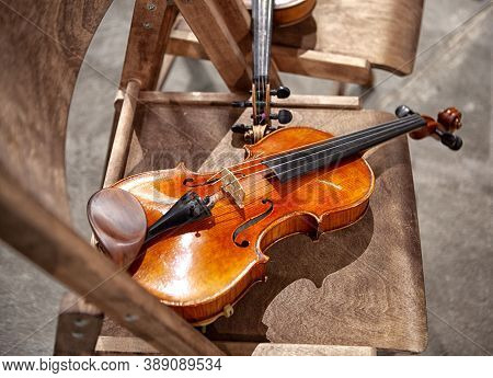 Cellos And Violas At Rest Before The Concert.